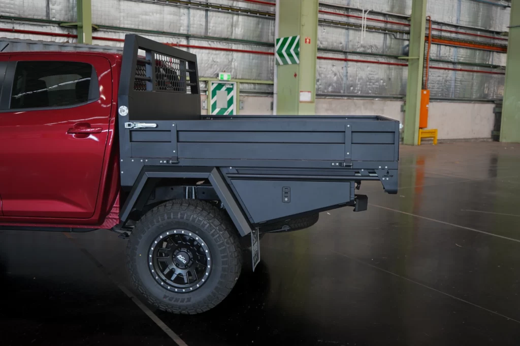 Side detail view of red Mazda BT50 with 1800mm alloy tray