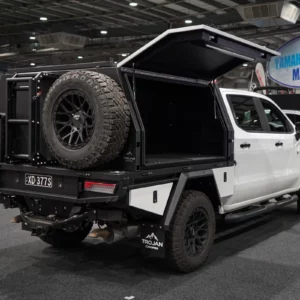 White Silverado ZR2 with Alloy Canopy door open