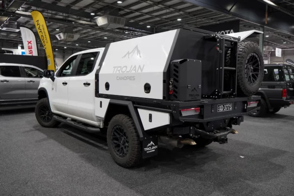 White Silverado ZR2 with Alloy Tray and Canopy from rear
