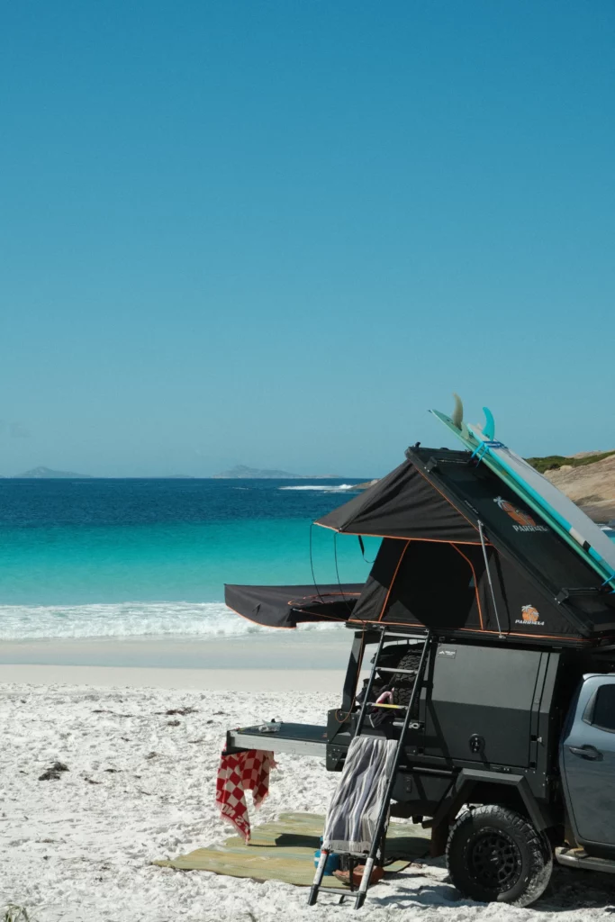 Slice of Bliss tray and canopy setup with surfboards