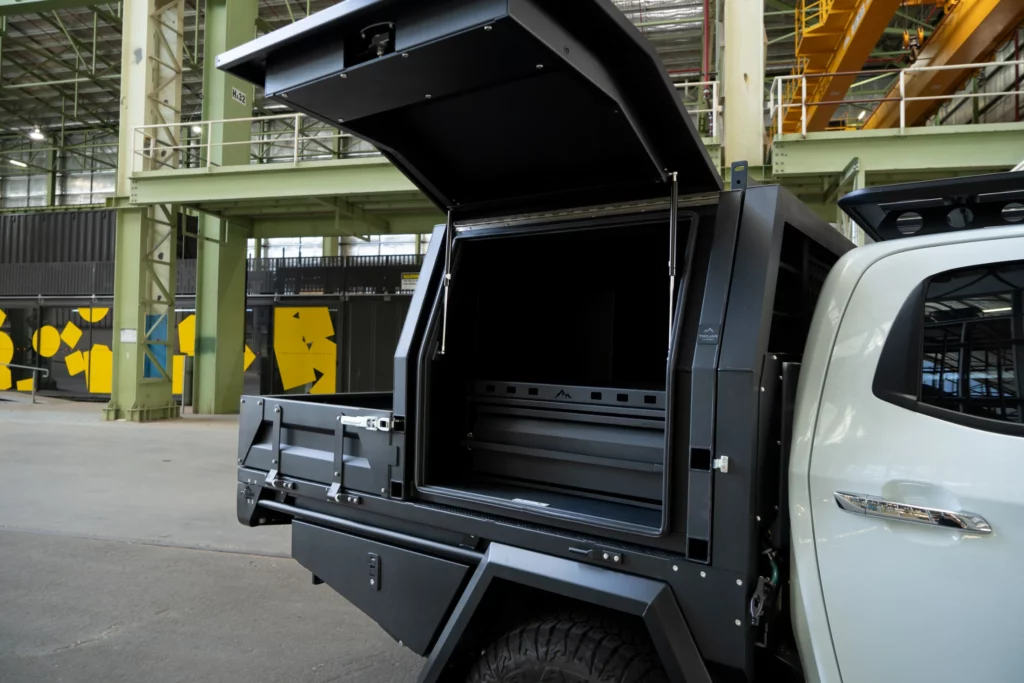 White DMax canopy with Trojan Canopies modular draw system