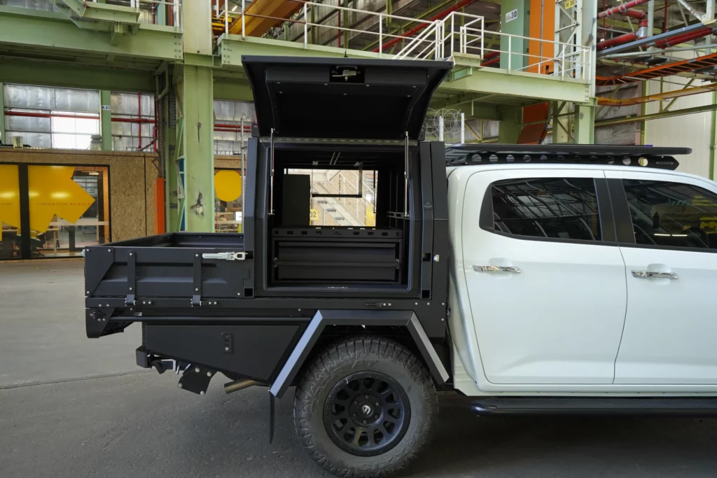 White DMax canopy open driver side