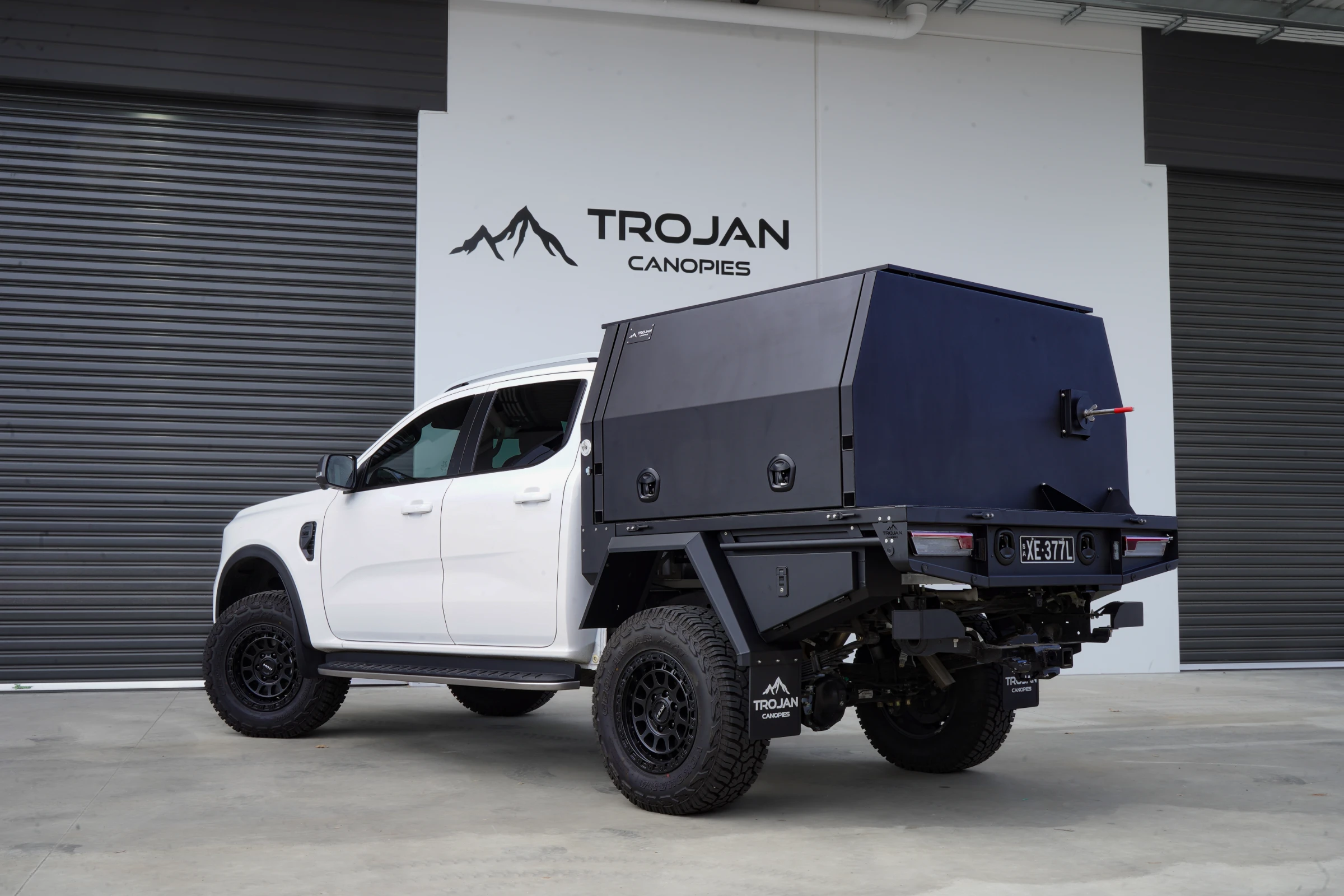 White Ford Ranger with Trojan Tray and Canopy with spare wheel holder