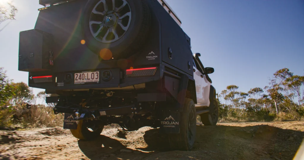 Hilux with Trojan Canopies tray on 4WD track