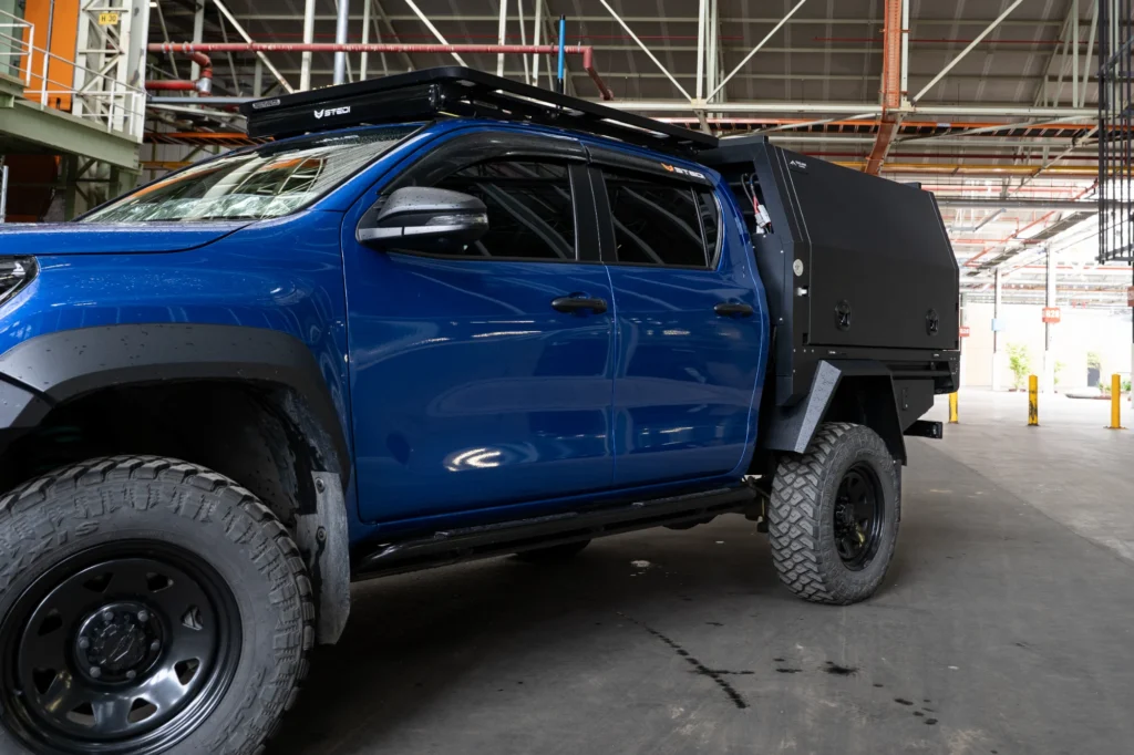 Passenger side view of Trojan Canopies 1600 Tray 1600 canopy Hilux