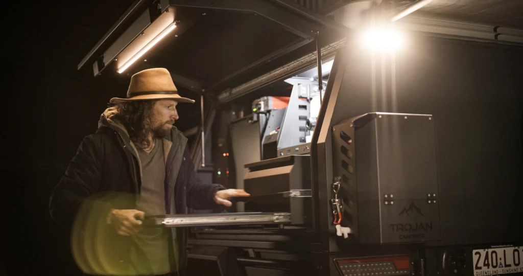 Trojan Canopies passenger side fit out at camp