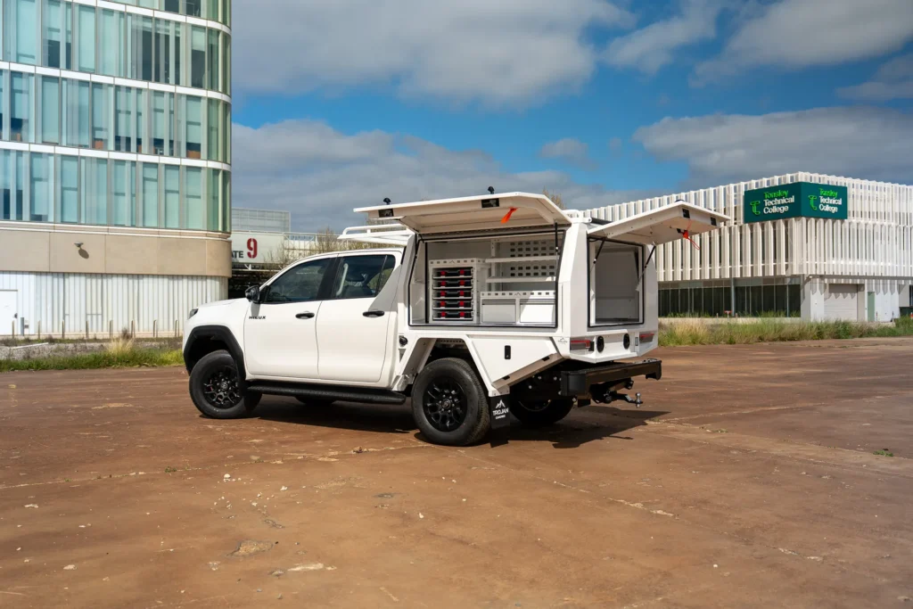 Rear-quarter view of a Hilux trade body with gullwing doors open