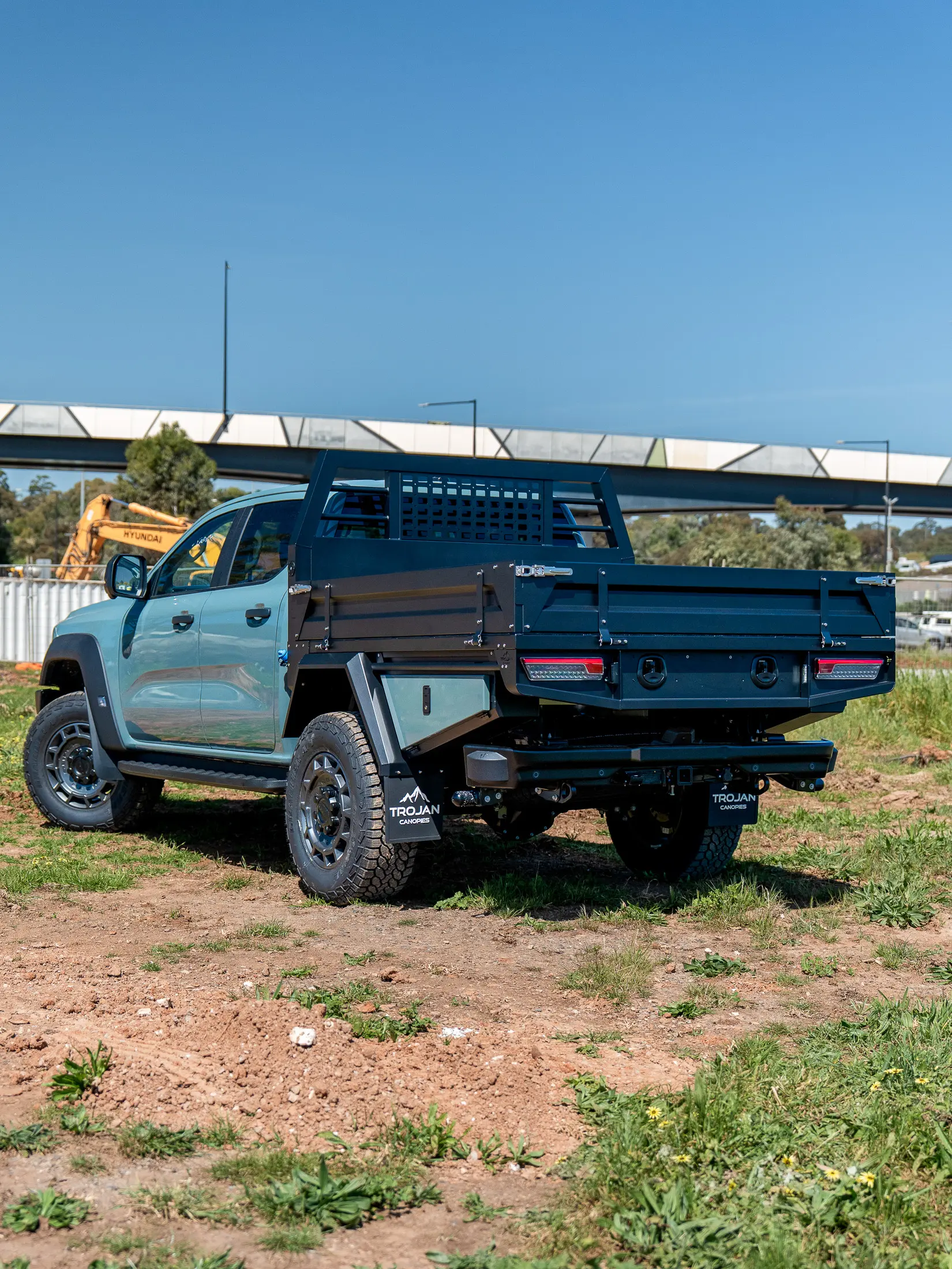 Rear view of a dual-cab ute fitted with a Trojan aluminium tray